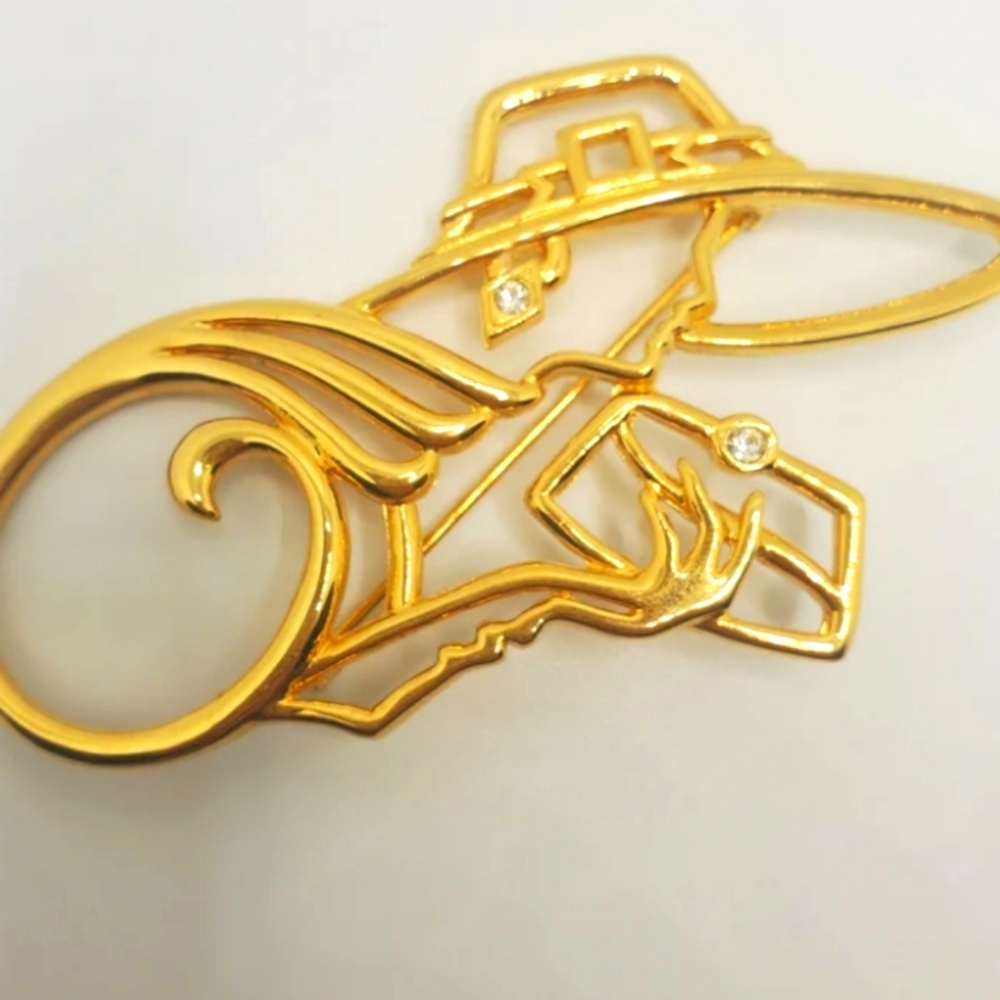 Lady Remington brooch. Excellent vintage condition. For lapel, vest, scarf.